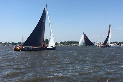 Huisje met ruime tuin in watersport gebied