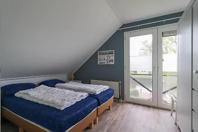 Bungalow am Wasser in Makkum mit Anlegestelle