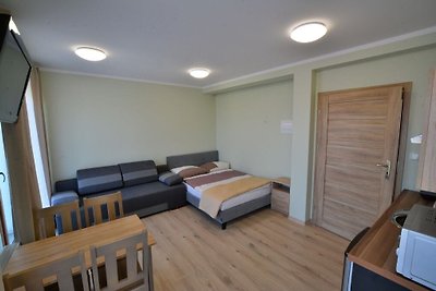 Appartement in Sarbinowo met een tuin