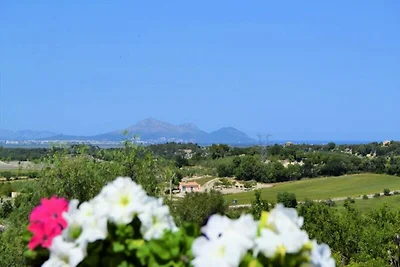 Huis in Muro met uitzicht op de baai van...