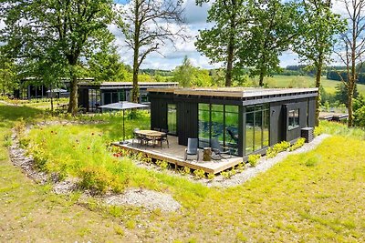 Prachtige lodge met sauna in een natuurresort