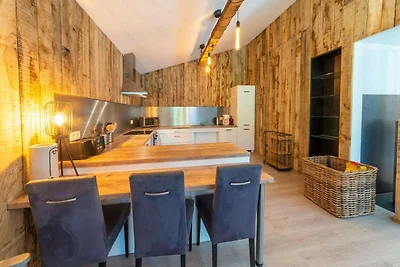 Weelderig chalet vlakbij het meer van...