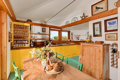 Cottage sul fiume con vista sull'estuario