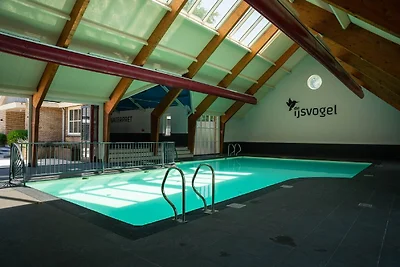 Bungalow mit einer überdachten Terrasse