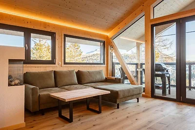 Chalet con vasca idromassaggio sul balcone
