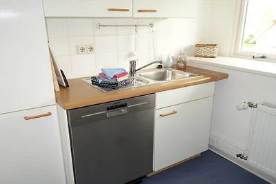 "Meeuw onder een rieten dak"