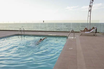Appartement aan Las Canteras met zwembad