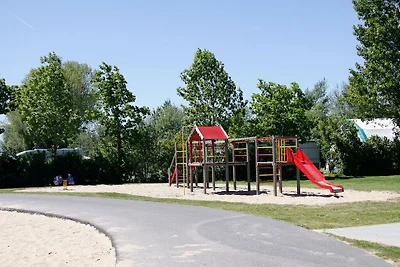 Chalet con caminetto in un villaggio vacanze