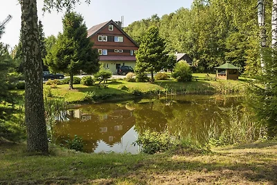 Połowa domu wakacyjnego, ogromny ogród, staw