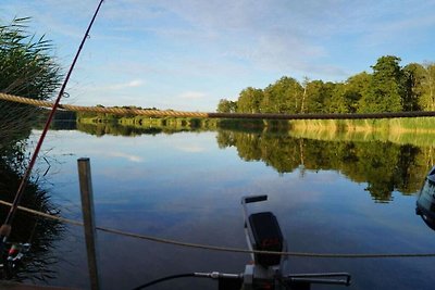 Hausboot in Loitz mit Schwimmbecken