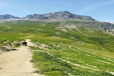 Appartement in Les Sybellen met hellingen