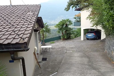 Holiday home in Magadino with swimming pool