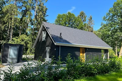 Ferienhaus in einem bewaldeten Gebiet in...