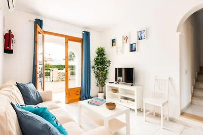 Wohnung in Cala Blanca mit Poolblick