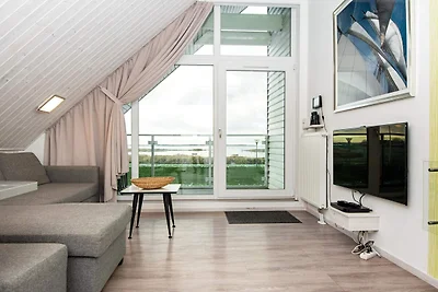Ostsee-Ferienhaus mit Hafenblick