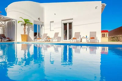 Villa aan het strand met privézwembad