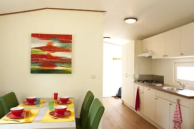 Well-kept chalet near the Maasduinen
