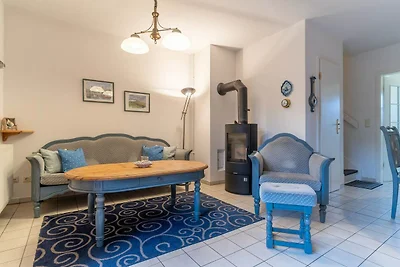 Apartment mit Kamin in einer reetgedeckten...