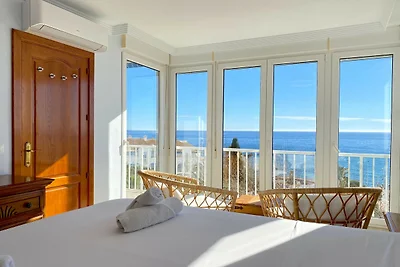 Wohnung in Nerja mit Garten und Poolblick