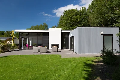 Chalet con caminetto in un villaggio vacanze