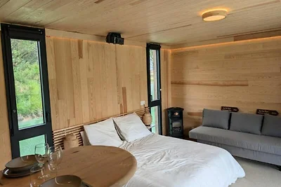 Ferienhaus an einem privaten Teich mit Blick ...