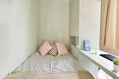 Camera accogliente in un accogliente appartam...