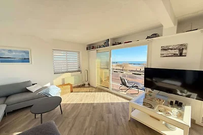 Appartement aan het strand met balkon