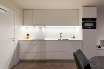 Modern appartement vlakbij zee en strand