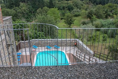 Appartamento con terrazza privata e piscina