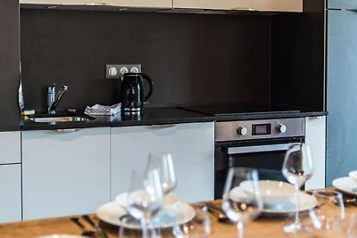 Ampio appartamento in legno antico sulle pist...