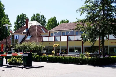 Chalet con caminetto in un villaggio vacanze