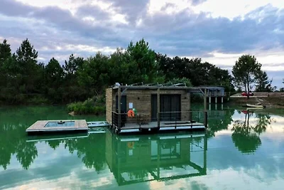 Ferienhaus an einem privaten Teich mit Blick ...