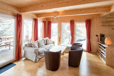 Chalet attraente con vasca idromassaggio