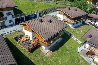 Rustig Alpenhuisje voor 9 met Suana