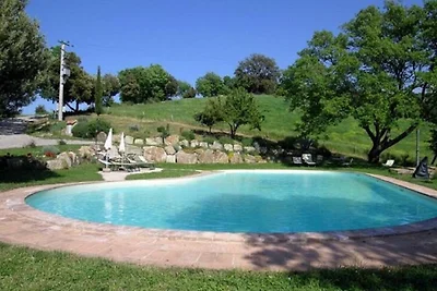Attraente casa vacanze con piscina in comune