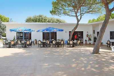 Reihenbungalow in einem Feriendorf Lido del M...