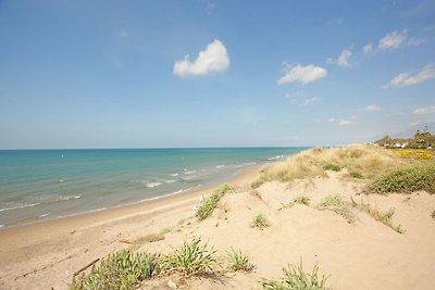 Appartement aan het strand met gedeeld...