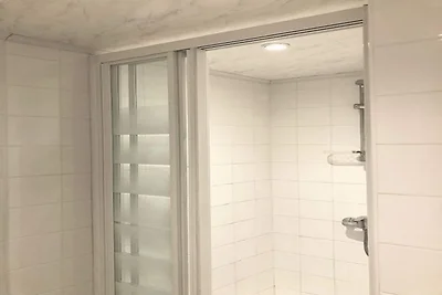 Wohnung und Blick auf den Privatstrand.