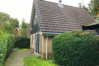 Schönes Ferienhaus mit Kamin in einem Ferienp...
