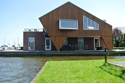 Schönes Penthouse mit Blick über den See