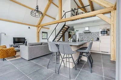 Soggiorno in lodge moderno con vista sullo...