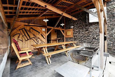 Traditionelles Ferienhaus mit Grill