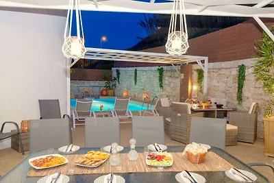 Villa aan het strand met privézwembad
