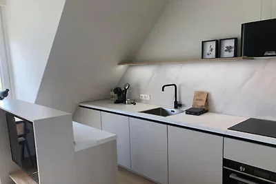 Lodge im 2. Stock mit Blick auf die Dünen.