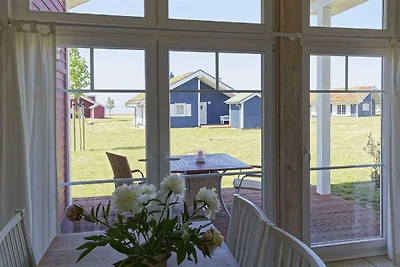 Bungalow moderno con stufa a legna e vista...