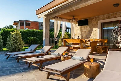 Beti with heated pool