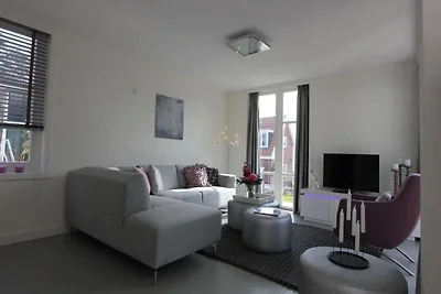 Villa aan het water met dakterras voor 6...