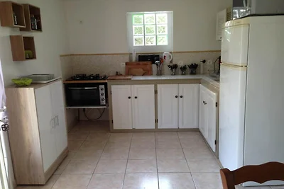 Haus am Flussufer in Folelli