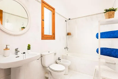 Wohnung in Cala Blanca mit Poolblick