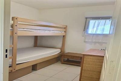 Appartement aan het strand met zwembad